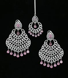 This beautiful Silver American Diamond Chandbali Earring Tikka set features silver tone Rhodium plating and is adorned with sparkling American diamonds. Perfect for Indian weddings, Bollywood fashion, Punjabi style Chandbali, and Pakistani weddings, this jewelry set will give you the perfect glamorous look. Diamond Chandbali, Indian Jhumka, Chandbalis Earrings, Punjabi Style, Indian Designs, Chandbali Earrings, Kundan Necklaces, Cz Jewelry, Glamorous Look