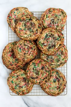 cookies on a cooling rack with sprinkles