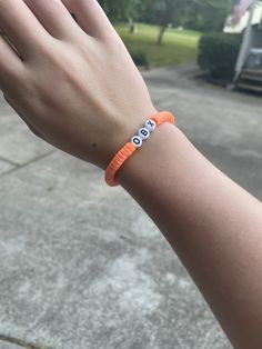 A clay bead bracelet with two different shades of orange and OBX(outer banks) in the middle. Different Shades Of Orange, Obx Outer Banks, Outer Banks Style, Clay Bead Bracelet, Clay Bead, Shades Of Orange, Jewelry Inspo, Clay Beads, Outer Banks