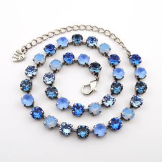 Bluebell The Bluebell pattern's stunning collection of blue, sapphire and air blue opal crystals is sure to add a touch of sparkle to your day. Whether it's a spring wedding or a special birthday, these exquisite crystals are sure to make your outfit shine. Product Details: Crystal Size: 8.5mm Crystal Color: Denim Blue, Light Sapphire Matte, Sapphire, Air Blue Opal, Light Sapphire Setting Options: Shiny Silver, Antique Silver, Gold, Rose Gold, Antique Brass, Antique Copper, Rhodium Necklace Length: Adjustable from 14 to 17 inches. Bracelet Length: Adjustable from 6 to 8 inches.  Handmade in the USA with nickel free settings and the highest quality European crystal elements. 8.5mm Crystal Jewelry handmade with the highest quality European crystal elements. Pieces are shown in a Shiny Silver Crystal Jewelry Necklaces, Handmade Crystal Jewelry, Make Your Outfit, Light Sapphire, Brass Antique, Opal Crystal, Crystal Necklaces, Adjustable Necklace, Special Birthday