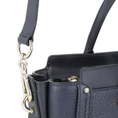 COACH SWAGGER 27 IN PEBBLE LEATHER - PitaPats.com Luxury Navy Shoulder Bag With Gold-tone Hardware, Coach Shoulder Bag With Cell Phone Pocket For Everyday, Luxury Navy Shoulder Bag With Detachable Strap, Coach Business Shoulder Bag With Cell Phone Pocket, Navy Leather Shoulder Bag With Gold-tone Hardware, Coach Shoulder Bag With Metal Hardware For Office, Classic Navy Shoulder Bag With Gold-tone Hardware, Elegant Blue Shoulder Bag With Cell Phone Pocket, Coach Satchel With Gold-tone Hardware For Business