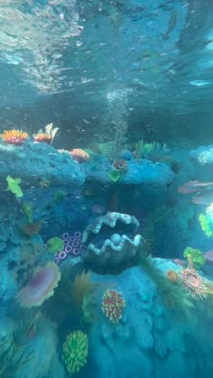 an underwater scene with corals and other marine life