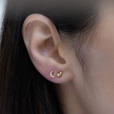 Such a cute, and dainty pair of earrings! They're perfect alone or stacked. They're a tiny pair that are perfect for second piercings, cartilage piercings, or for a minimalist touch. ✤✤ Details ✤✤ ★ Made of 925 Sterling Silver ☾ We use a THICK plating of 14k Gold or Rhodium for a piece that is sure to last you years to come ★ Sold as a PAIR ☾ Nickel-free & Hypoallergenic ★ Measures 5 mm x 4 mm ☾ We use the highest grade of cubic zirconia for an authentic diamond look Comes in a cute gift box Dainty Moon Shaped Hypoallergenic Earrings, Dainty Hypoallergenic Moon-shaped Earrings, Dainty Moon-shaped Hypoallergenic Earrings, Dainty Hypoallergenic Moon Earrings, Dainty Half Moon Charm Earrings, Dainty Half Moon Earrings With Moon Charm, Minimalist Half Moon Earrings For Gift, Moon Shaped Everyday Earrings, Dainty Crescent Earrings For Everyday