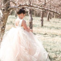 "This modern yet classic tutu dress features a lined ivory satin sleeveless bodice with a peach blush and ivory blend tulle skirt to yield this lovely blush color. The back of the dress bodice is stretchy for a custom, yet versatile, comfort fit. We can change these colors! WANT A SEWN IN SLIP TO LINE THE TUTU? https://www.etsy.com/listing/125566641/add-a-slip-to-the-tutu-dress-sewn-in?ref=shop_home_active_2 At checkout, please give us the following information: HOW TO ORDER: IMPORTANT We recomm First Communion Tutu Dress With Fitted Bodice, Bridesmaid Ball Gown Tutu Dress With Tulle Skirt, Bridesmaid Ball Gown Tutu Dress, Spring Princess Dress With Lace Bodice And Tulle, Spring Princess Dress With Fitted Bodice And Tulle, Tulle Tutu Dress With Fitted Bodice, Bridesmaid Tutu Dress With Fitted Bodice And Tulle Skirt, Organza Tutu Dress With Tulle Skirt For First Communion, Fitted Bodice Tulle Tutu Dress Ball Gown