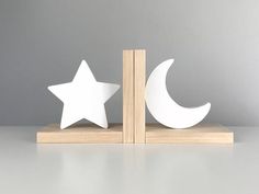 a bookend with two white stars and a crescent