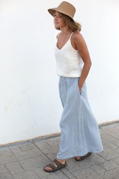 "Floor Length / Long Till The Ground / Linen Skirt with pockets / Wide Skirt with Elastic Waist / Women's skirt / A-Line Skirt / Details: - Made of 100% natural washed and soft medium weight (205 g/m Oeko-Tex certified linen; - Fabric won't see threw; - Colour: Greyish Blue, but there are 27 available colours in total (colour palette is below); - Pre-washed linen fabric; - Elastic waist; - With two side pockets; - There is no zipper; - Making time: approx. 3-5 working days. Find all available co Blue Linen Skirt Outfit, Spring Skirt Bottoms With Pockets, Casual Skirts With Pockets, Spring Relaxed Skirt With Pockets, Summer Skirt With Pockets In Relaxed Fit, Summer Skirt With Pockets And Relaxed Fit, Casual Skirt For Vacation, Spring Relaxed Skirt Bottoms With Side Pockets, Cotton Long Skirt With Pockets