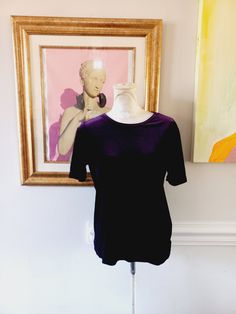 Vintage 90s Worthington Violet Purple Velvet Polyester Blend Crewneck Minimal Boxy Short Sleeve Top Shirt Blouse Tee Sz Medium This top is used but in great condition.  Has no rips, tears, staining and hardly no wear and tear.  Appropriate for any casual, professional, or evening occasion. Measurements:  Bust: 39"  Waist: 39"  Top to bottom: 24"  (Measurements are taken across item laying flat and are then doubled.) Thanks for looking! Domestic Shipping: First Class (2-5 days)  International Shi Purple Crew Neck Top For Layering, Vintage Crew Neck Tops For Layering, Classic Purple Relaxed Fit Top, Classic Purple Crew Neck Top, Purple Relaxed Fit Crew Neck Blouse, Vintage Purple Relaxed Fit Tops, Purple Short Sleeve 90s T-shirt, Playful Purple Short Sleeve T-shirt, Purple Soft-washed Relaxed Fit T-shirt