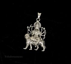 Divine 92.5 sterling silver Indian Hindu Idols Blessing Goddess Bhawani/Durga/Santoshi maa with lion vintage antique style stunning divine pendant, best gifting unisex jewelry from India. Metal-925 sterling silver. Item type-Pendant/ Locket Weight-17.910 grams. Height-5.9 centimeter. Width-3.5 centimeters. Stamped-925. Finish-Oxidized. note :chain is not include in this price, to purchase chain please visit following links: https://www.etsy.com/listing/823425858/16-to-30-long-screw-chain-925-ste Spiritual Sterling Silver Jewelry For Navratri, Silver Spiritual Jewelry For Navratri, Spiritual Silver Jewelry For Navratri, Sterling Silver Jewelry For Diwali Puja, Silver Spiritual Jewelry For Rituals, Spiritual Silver Jewelry For Rituals, Sterling Silver Jewelry For Navratri, Sterling Silver Jewelry For Puja And Festivals, Spiritual Oxidized Jewelry For Navratri