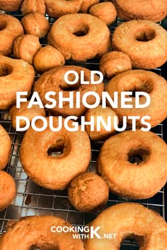 a bunch of doughnuts that are sitting on a rack with the words old fashioned doughnuts