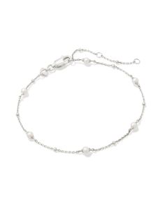 Why go for one pearl, when you could have a whole strand of them? The Emmaline Sterling Silver Delicate Chain Bracelet in White Pearl combines heirloom-quality metal and dainty cultured freshwater pearls to create a minimal essential made to match with everything—and last through every season. Metal Sterling Silver Why Sterling Silver? Our Sterling Silver collection features elevated styles to wear time and time again. With a base of both pure silver and copper, Sterling Silver provides a precious yet affordable option that offers long-lasting wear and shine and is the perfect addition to your Demi-Fine jewelry rotation. Learn More About Metals & Care Material White Pearl Closure Lobster Clasp Size 6.5" With 2" ExtenderDue to the one-of-a-kind nature of the medium, exact colors and pattern Silver Dainty Bracelet, Silver Bracelets Dainty, Cute Dainty Jewelry Silver, Kendra Scott Bracelet Silver, Silver Dainty Bracelets, Elegant Silver Beaded Bracelets With Delicate Chain, Elegant Silver Beaded Bracelet With Delicate Chain, Dainty Silver Bracelets, Cute Silver Jewelry