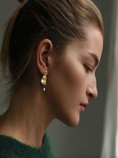 A modern take on peals. Brass earrings with fresh water pearl drop. Made in NYC. Measures: 9/16" (1.5cm) (W), 1 3/8" (3.5cm) (H) Pearl : 5mm Modern Pearl Charm Drop Earrings, Modern Pearl Chain Earrings As Gift, Modern Gold Long Drop Pearl Earrings, Modern Long Drop Pearl Earrings, Modern Everyday Pearl Earrings, Teardrop Akoya Pearl Pendant Earrings, Akoya Pearl Drop Teardrop Earrings, Teardrop Akoya Pearl Earrings With Pearl Pendant, Teardrop Akoya Pearl Drop Earrings