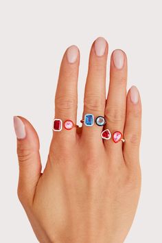 Make a statement day or night. This ring adds the perfect amount of sparkle to any occasion. Features a rectangular and round lab-created gemstone with contrasting colored enamel. Modern Ring With Rectangular Accent Stones, Modern Rings With Rectangular Accent Stones, Modern Jewelry With Rectangular Accent Stones, Modern Rings With Stones, Modern Rectangular Rings With Accent Stones, Modern White Rings For Party, Modern Enamel Jewelry With Gemstone, Modern White Party Rings, Modern Multi-stone Rectangular Jewelry