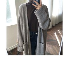 Introducing the Casual Long Pocket Cardigan Sweater, a versatile and stylish addition to any wardrobe. Made from high-quality materials, this cardigan offers both comfort and functionality with its long design and convenient pockets. Perfect for creating a casual yet sophisticated look. Designed by 4COLORDRESS