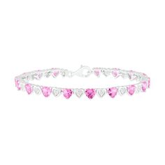 Enjoy the vibrant color of this heart fashion bracelet. Created in sterling silver, this design features 5.0mm heart-shaped lab-created bright pink sapphires alternating with shimmering lab-created white sapphire clusters within polished heart-shaped frames. Buffed to a brilliant luster, this 7.25-inch link bracelet secures with a lobster claw clasp. Heart-shaped Sterling Silver Bracelets, Sterling Silver Heart Bracelets Fine Jewelry, Sterling Silver Heart Bracelet Fine Jewelry, Sterling Silver Heart-shaped Fine Bracelets, Pink Heart-shaped Sterling Silver Bracelet, Pink Heart-shaped Sterling Silver Bracelets, Valentine's Day Heart Cut Fine Jewelry Bracelets, Valentine's Day Fine Jewelry Heart Bracelet, Fine Jewelry Heart Cut Bracelet For Valentine's Day