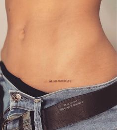 a woman's stomach with an inscription on it