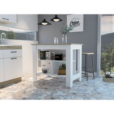 a white kitchen with an island in the middle