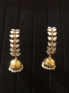 Very beautiful Bali and jhumki style hoop earrings.semi precious stones two color White : pre order and shipping time 4-6 weeks. Hand crafted and gold plated kundan indian/pakistani jewelry Material:brass,stone,gemstone,pearl We bring you casual as well as party wear jewelry which comes with an attractive design and style. It goes well modern and traditional outfits. Visit my website for more collections https://www.etsy.com/shop/Noorzaracollection Dual-tone Kundan Jewelry, Temple Jewelry Kundan Jhumkas For Pierced Ears, Elegant White Kundan Earrings, Dual-tone Metal Earrings For Wedding, Wedding Dual-tone Metal Earrings, Dual-tone Metal Danglers For Wedding, Chandbali Earrings With Stone Work, Earrings With Stone Work For Festivals Celebration, Earrings With Stone Work For Celebration Festivals