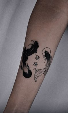 a person with a tattoo on their arm