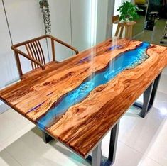 a wooden table sitting on top of a white tiled floor