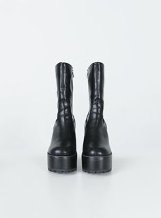 Boots Princess Polly Exclusive Upper & insole: 100% PU Linning: 100% textile Outsole: 80% EVA 20% TPR Faux leather material Mid-calf length Zip fastening at side Rounded toe Platform base Block heel Treaded sole Heel height: 12cm / 4.7in Black Chunky Platform Mid-calf Boots For Party, Black Leather Platform Mid-calf Boots, Black Mid-calf Platform Boots Medium Width, Holiday Party Shoes, Black Leather Platform Boots With 4-inch Heel, Black Ankle-high Platform Boots With Zipper, Festival Shoes, Lace Up Wedges, Exclusive Shoes