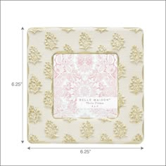 a white and gold photo frame with an ornate design on the front, measurements for each piece