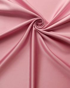 a close up view of a pink fabric