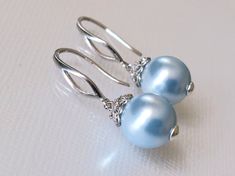 Wedding Light Blue Blush Blue Pearl Drop Silver Dangle Bridal Earrings. EARRINGS are about 1.18 inch (3cm) long from top of earring wire to bottom. BRIDAL EARRINGS SECTION: https://www.etsy.com/shop/LanaChayka?ref=seller-platform-mcnav§ion_id=11638940 BRIDAL JEWELRY SETS SECTION: https://www.etsy.com/shop/LanaChayka?ref=seller-platform-mcnav§ion_id=25839214 BRIDAL NECKLACES SECTION: https://www.etsy.com/shop/LanaChayka?ref=seller-platform-mcnav§ion_id=11638944 Elegant and classy, these earrings Elegant Light Blue Earrings For Gift, Elegant Blue Teardrop Bridal Earrings, Elegant Light Blue Evening Jewelry, Blue Drop Earrings For Bridal Formal Occasion, Blue Drop Earrings For Formal Bridal Wear, Elegant Light Blue Jewelry For Party, Blue Dangle Bridal Earrings For Formal Occasions, Elegant Blue Teardrop Pearl Earrings, Blue Teardrop Pearl Drop Earrings