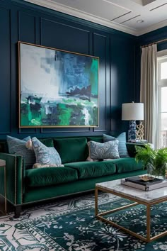 a living room with blue walls, green couches and large painting on the wall