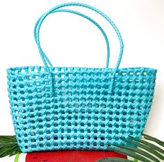 Beachy Brights Basket Tote Bag in Turquoise Blue - Giddy Up Glamour Boutique Summer Vacation Beach Bag In Plastic, Summer Vacation Plastic Beach Bag, Beach Tote Bag In Plastic, Summer Travel Beach Bag Made Of Plastic, Plastic Beach Tote Bag, Plastic Tote Bag For Beach, Light Blue Beach Bag For Spring, Beachy Green Rectangular Beach Bag, Spring Blue Straw Bag For Shopping