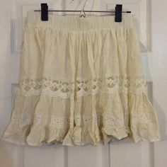 New With Tags. Beige Color With An Under Layer. Size Medium. Beige Skort For Spring, Bohemian Short Mini Skirt For Spring, Spring Bohemian Short Mini Skirt, Casual Spring Skirt With Lace Trim, Summer Mini Skirt With Lace Trim, Casual Tiered Mini Skirt With Lace Trim, Summer Mini Skirt With Lace Trim For Day Out, Casual Skirt With Lace Trim For Vacation, Summer Lace Trim Mini Skirt For Day Out