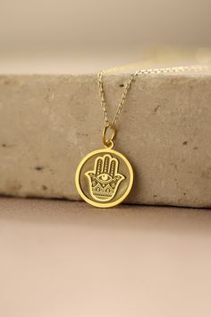 Gold Hamsa Fatima Pendant - Hamsa Fatima Gold Necklace ● Material of pendant: Solid Gold 14k ( REAL GOLD ) ● Metal Stamp: 14k ( REAL GOLD ) ● The pendant is available in 5 sizes: - 12,7 mm / 0.5 inches (Diameter) - 14,0 mm / 0,55 inches ( Diameter ) In the photos - 15,3 mm / 0.6 inches ( Diameter ) - 16,5 mm / 0,65 inches ( Diameter ) - 19,1 mm / 0,75 inches ( Diameter ) ( In the photos the size is 14mm / 0.55 inches Diameter ) ( Jump Ring inner diameter: 4 mm ) ● Material of chain: Solid gold 1 Spiritual Necklace For Mother's Day Blessing, Symbolic Medallion Necklace For Weddings, Traditional Gold Necklaces For Mother's Day, Spiritual Pendant Necklaces As Gifts, Traditional Charm Jewelry For Gifts, Traditional Gold Necklace For Mother's Day, Traditional Personalized Jewelry For Mother's Day, Traditional Pendant Charm Necklaces For Gift, Traditional Pendant Charm Necklaces