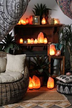 a living room filled with lots of lit candles