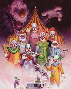 a group of clowns standing in front of a circus tent