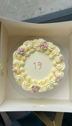 a cake in a box with the number 19 on it