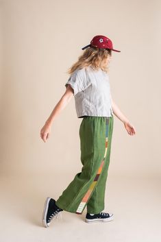 Stand out in our Patchwork Sunset Pants—a one-of-a-kind masterpiece crafted from a collection of cotton and linen fabric scraps we've carefully saved throughout the year. These unique pants are perfect for transitioning effortlessly between summer and fall, and back again. Stripe colors/fabrics will vary. Features: One-of-a-Kind Design: Each pair is a unique patchwork of carefully selected fabric scraps. Versatile Styling: Ideal for shifting seasons, blending summer ease with autumn warmth. Pull Striped Linen Pants Outfit, Between Summer And Fall, Jumpsuit And Cardigan, Unique Pants, Linen Pants Outfit, Striped Linen Pants, Patchwork Pants, Elastic Pants, Man Repeller