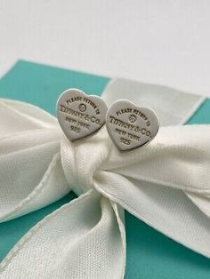 ad eBay - Authentic Tiffany & Co Sterling Silver & Diamonds Mini Heart Stud Earrings. Stud: T&Co Ag925. -Sterling silver with round brilliant diamonds. -Size mini 10 x 10 mm (1 x 1 cm) Approx. Designer Polished Finish Earrings For Anniversary, Classic Heart Earrings For Valentine's Day Formal, Elegant Heart Cut Jewelry With Hallmarks, Designer Heart Shaped Earrings For Formal Occasions, Luxury Double Heart Jewelry For Formal Occasions, Designer Heart-shaped Wedding Jewelry, Luxury White Heart Earrings For Wedding, Formal Fine Jewelry Heart Earrings, Designer Pierced Wedding Earrings