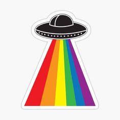 a rainbow sticker with an alien spaceship in the center and a black hat on top