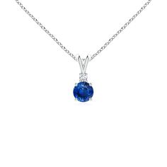 This four-prong set sapphire pendant displays the perfect blend of style and beauty. A lustrous diamond on top of the blue gemstone enhances its charm. This classic solitaire sapphire pendant with a polished v-bale is artfully designed in 14k white gold. Classic Sapphire Necklaces With Prong Setting, Classic Blue Necklace With Diamond Accents, Classic Blue Sapphire Necklace, Classic Sapphire Necklace With Prong Setting, Blue Diamond Birthstone Necklace, Blue Round Diamond Birthstone Necklace, Blue Diamond Round Birthstone Necklace, Elegant Blue Gemstone Solitaire Necklace, Blue Diamond Necklace With Prong Setting