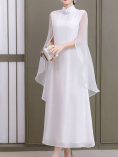 🚚FREE Shipping on orders over $80 ✨ use Code: "Mylook" for Extra Discount at checkout ﻿- 📏Sizing: run a little small 📏 Highlights - Perfect for the winter season, this beautiful white dress is designed for women.- With an elegant style, it's perfect for formal events or classy occasions. - The stand collar neckline adds a touch of sophistication to the dress, making it stand out and giving you a refined look. - With its long dress maxi dress design, it's not only stylish but practical too, making it a great addition to any woman's wardrobe. Specifications Gender: Women's, Style: Hanfu, Elegant, Chinoiserie, Traditional, Occasion: Outdoor, Going out, Daily, Tea Party, Vacation, Dresses Type: White Dress, Chiffon Dress, Swing Dress, A Line Dress, Neckline: Stand Collar, Fabric: Polyester, White Dress Long, Maxi Dress Designs, Beautiful White Dresses, Maxi Dress Outfit, Long White Dress, Dress With Sleeves, Cheongsam Dress, Midi Dress Casual, White Solid