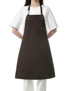 a woman wearing an apron and white shirt