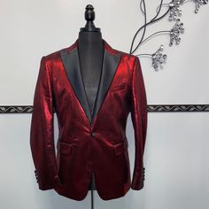 This Blazer Features A Beautiful Metallic Red Finish, 65% Polyester 35% Cotton Fabric, With Front Pockets And Front Button Closure. Red Festive Semi-formal Blazer, Luxury Red Blazer For Parties, Luxury Red Party Suits, Luxury Red Blazer For Formal Occasions, Red Luxury Blazer For Formal Occasions, Luxury Red Suits For Winter, Luxury Red Formal Blazer, Red Winter Formal Suit, Red Party Suits For Fall