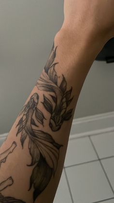 a person with a tattoo on their arm