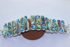 Beautiful Avalon and Blue topaz stone handmade silver plated bracelet. stone color - blue and green stone name - Avalon and blue topaz metal plating - silver oxidized material - brass HAPPY SHOPPING WITH US THANK YOU. Blue Stone Bracelet For Gift, Blue Gemstone Fusion Bracelet, Blue Sterling Silver Spiritual Bracelet With Gemstones, Spiritual Blue Sterling Silver Bracelet With Gemstone, Blue Fusion Style Bracelet As A Gift, Blue Fusion Style Bracelet As Gift, Blue Fusion Style Bracelet For Gifts, Blue Fusion Style Bracelet For Gift, Unique Blue Sterling Silver Bangle Bracelet