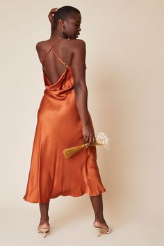 Turn every head in this sexy and sophisticated slip dress! The Fiona dress has adjustable straps for the right fit, while the bias cut creates an elegant cowl back and midi-length flare at the bottom. Tie-back Slip Dress For Date Night, Fitted Bias Cut Slip Dress With Low Back, Elegant Backless Midi Dress With Adjustable Straps, Chic Slip Dress With Low Back, Date Night Midi Dress With Delicate Straps, Silk Bias Cut Slip Dress For Date Night, Backless Midi Dress With Adjustable Straps For Evening, Evening Backless Midi Dress With Adjustable Straps, Elegant Backless Dress With Adjustable Straps For Date Night