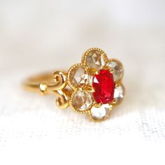 Neon Red Spinel Halo Ring. Cushion Cut Pink Spinel With Rose-cut Sapphires. Made to Order - Etsy Elegant Ruby Cluster Ring With Rose Cut Diamonds, Red Oval Cluster Ring With Rose Cut Diamonds, Victorian Ruby Jewelry With Single Cut Diamonds, Wedding Jewelry With Single Cut Diamonds And Lab-created Ruby, Exquisite Red Ruby Promise Ring, Oval Ruby Cluster Ring With Rose Cut Diamonds, Ruby Wedding Ring With Rose Cut Diamonds, Red Victorian Diamond Ring, Heirloom Red Rings With Single Cut Diamonds