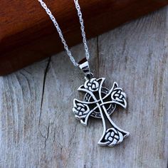 "This symbol has been used by Christians as a sign of the Blessed Trinity (Father, Son and Holy Spirit). The Celtic Cross, is made to be visually beautiful. Great collection of Crosses: http://etsy.me/1kXz4tH The circle of this gorgeous pendant represents friendship, affection, that cannot be broken. Cast using 100% sterling silver, no pewter, nickel or lead was used to create this tree of life, buy with peace of mind. . Additional Meaningful, symbolic Jewelry http://etsy.me/16So5MK . Need initi Blessed Trinity, Celtic Cross Necklace, Father Son And Holy Spirit, The Celts, Cross Christian, Celtic Tattoos, Niagara Falls Ny, Symbolic Jewelry, Christian Cross