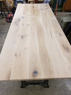 the table is being made and ready to be put into place in the shop or workshop