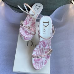 Christian Dior Girly Cherry Blossom Monogram Platform Sandals Pink Floral Monogram With Cherry Blossom Canvas Soles With Patent Leather Heels And Wrap Around Ankle Straps Silver Chain And Buckle Detail In Prestine Condition New With Box 100% Authentic Heel Height (In) 2.5" Cute Floral Shoes, Lace Platform Heels, Cherry Blossom Heels, Vintage Dior Shoes, Pink High Heels With Bow, Pink Quince Heels, Pink High Heels Aesthetic, Dior Heels Aesthetic, Pink Dior Shoes