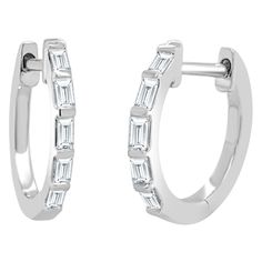 This pair of Diamond Baguette Huggie Hoop Earrings are sure to be your new favorite. With shimmering 0.25 ct. of baguette-cut diamonds adorning the Huggie, they create the perfect amount of sparkle for any look. Crafted in 14k Rose Gold with easy to use latch back posts these diamond earrings are the perfect everyday accessory and an ideal gift for any occasion. 14K Gold 0.25 carats Natural White Diamonds Baguette Cut Diamonds Latch Back Posts Gift Box Included! Ships in 1-2 Business Days! Luxury Wedding Hoop Earrings With Baguette Cut, Luxury Baguette Cut Hoop Earrings Fine Jewelry, Luxury Gold Baguette Cut Huggie Earrings, Luxury Gold Baguette-cut Huggie Earrings, Luxury Baguette Diamond Huggie Earrings For Everyday, Luxury Baguette Cut Huggie Earrings For Women, Luxury Baguette Cut Huggie Earrings For Formal Events, Luxury Formal Baguette Cut Huggie Earrings, Luxury Round Huggie Earrings With Baguette Diamonds