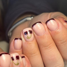 Cherry nails are for all year round. This gorgeous set is perfect for this time of year, with a dark red/bourbon French tip to match the cherries.

Created by @islasnailsandbeauty on Instagram